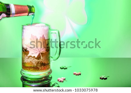 Cold beer for st.Patrick's day holiday celebration on green background