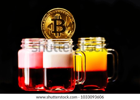Crypto currency Gold Bitcoin, BTC, macro shot of Bitcoin coins with colour drink shot,  bitcoin and party concept