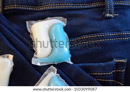 Capsule gel for washing jeans stack isolated