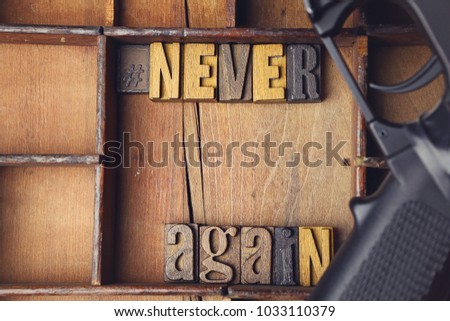 Never Again in wooden typeset letterpress