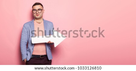Handsome man in bright jacket with speech pointer