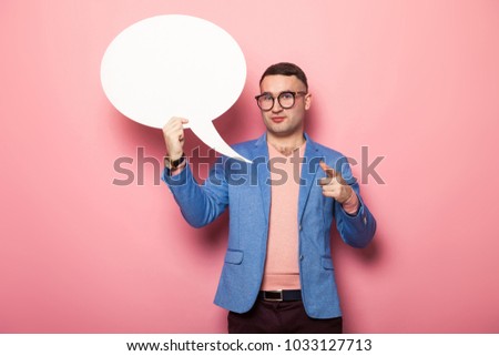 Handsome man in bright jacket with speech bubble