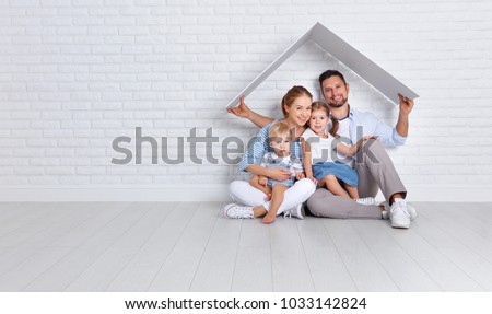 concept housing a young family. mother father and children in a new home

