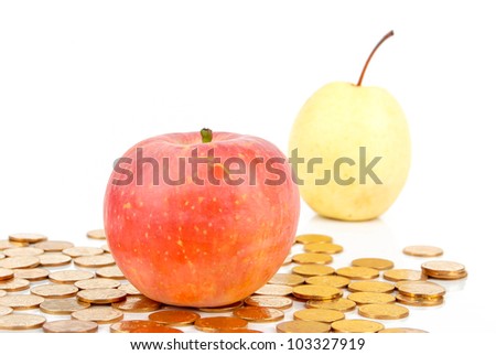 Red apple and pear with coin