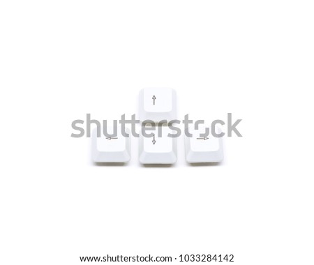 Four white keyboard arrow button isolated on white background