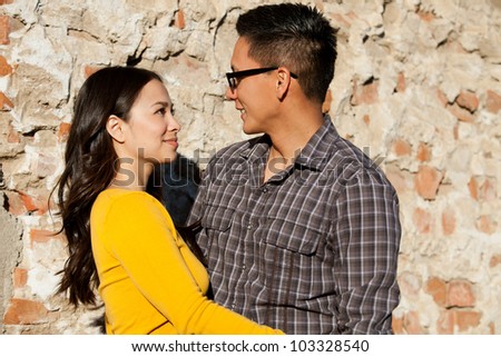 Ethnic young couple smiling and happy