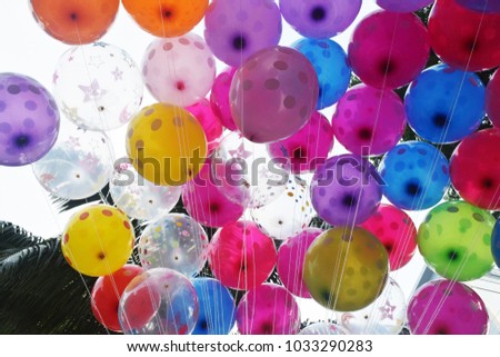 Festive balloons for birthdays and other celebration in Taman Bungkul Park, Surabaya, Indonesia