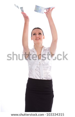Business young woman catches money from above - isolated over a white background