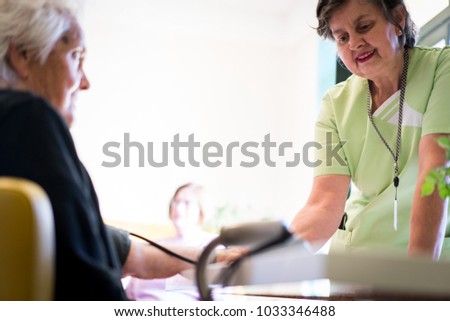Elderly woman needs care of medical nurse