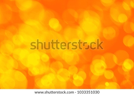 Abstract bokeh background in shades of blurry lights yellow and orange. Panoramic view