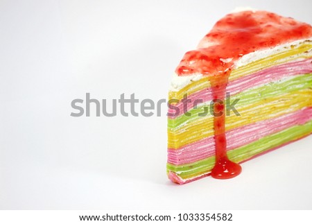  Yummy rainbow cakes and white background Royalty-Free Stock Photo #1033354582
