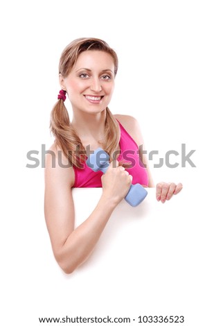 Fitness young woman holding the blank board