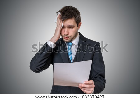 Nervous man is afraid of public speech and sweating. Royalty-Free Stock Photo #1033370497