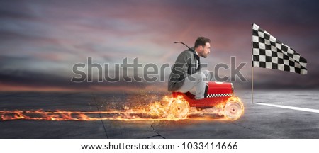 Fast businessman with a car wins against the competitors. Concept of success and competition Royalty-Free Stock Photo #1033414666