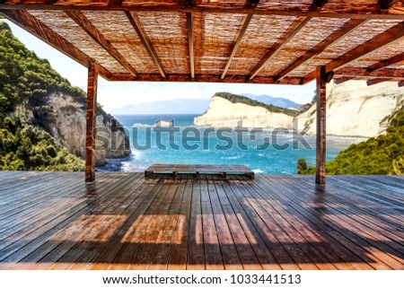 Summer day and free space for your decoration on wooden brown terrace with landcape of ocean. 
