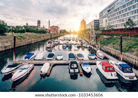 Duisburg Marina with ships and modern buildings
