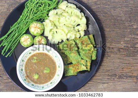 Chili paste with vegetables as a side.
