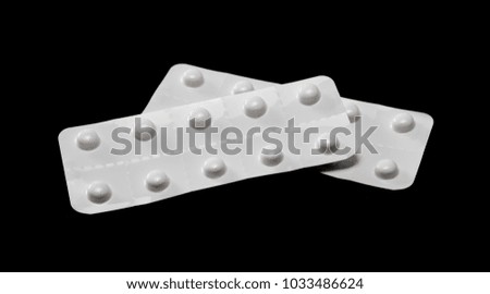 Tablets in blister pack, medicine, isolated on black background