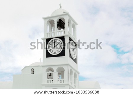 Clock tower in Greece. Architecture, Greece style. Top of the church. 