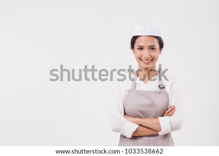 happy smiling confident professional asian woman domestic worker, domestic helper, woman housekeeper, girl shopkeeper, housewife, girl cleaner, woman maid, girl cleaning service staff studio portrait Royalty-Free Stock Photo #1033538662