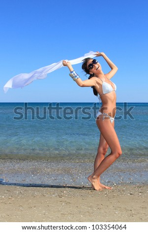 Summer beach young woman in bikini