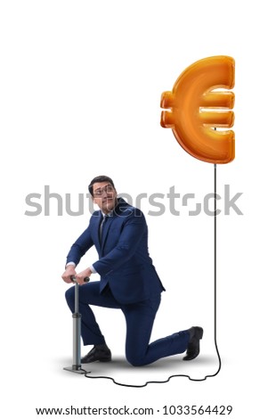 Businessman pumping euro sign in business concept