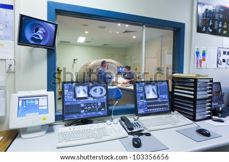 MRI respiratory lung scan of patient with doctor and nurse Royalty-Free Stock Photo #103356656