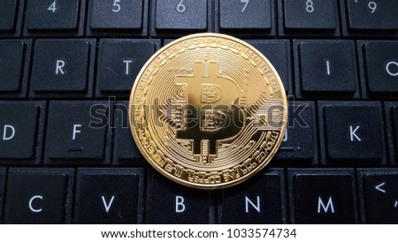 Bitcoin on black keyboard


