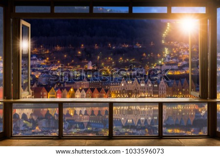 Beautiful Blank coffee shop or (cafe,restaurant) against blurred Famous Bryggen street with wooden colored houses in Bergen, Norway background, For montage product display or design key visual layout.