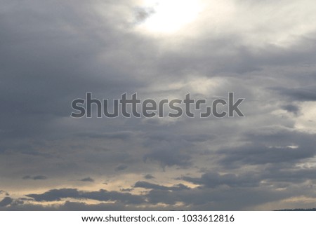gray sky sun behind cloud dirty 