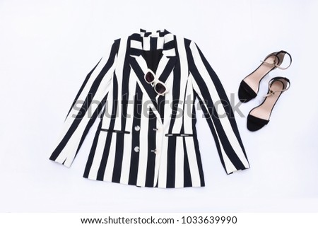 Women's elegant striped jacket isolated with shoes, sunglasses on white background
