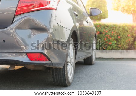 Car a broken rear bumper, damage car accident, copy space. Royalty-Free Stock Photo #1033649197