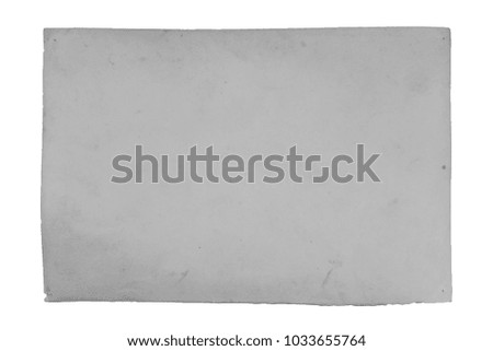 Old photo texture with stains and scratches. Vintage and antique art concept. Front view of blank black & white old aged dirty frame isolated on a white background. Detailed closeup studio shot.