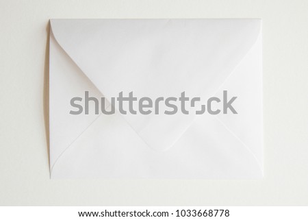 white envelope over white background