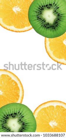 Background from orange and kiwi slices. Tropic fruit. 