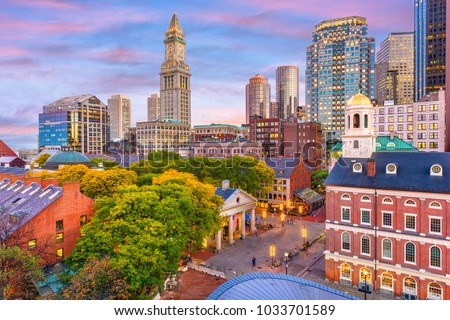 Boston, Massachusetts, USA skyline with Faneuil Hall and Quincy Market at dusk. Royalty-Free Stock Photo #1033701589