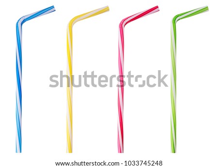 Four drinking straw pink, blue, yellow, green striped isolated on white background. Clipping Path. Full depth of field. Royalty-Free Stock Photo #1033745248