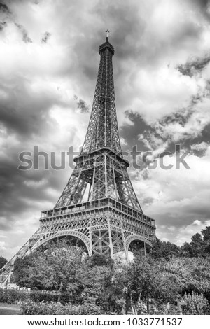 Eiffel Tower at sunset in Paris, France. HDR. Romantic travel background. Eiffel tower is traditional symbol of paris and love.