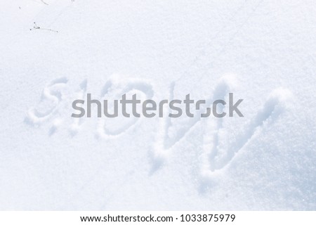inscription on deep white snow