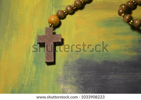  cross on chain on colorful background