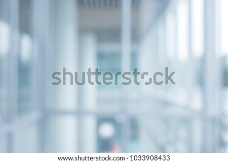 Blurred abstract  grey glass wall from building background.
