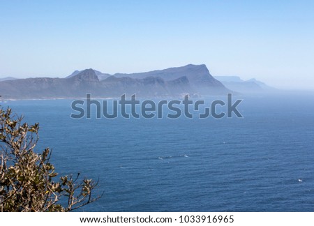 Mountains "Shark's fins" on the coast of the Indian Ocean in South Africa. Tonal perspective