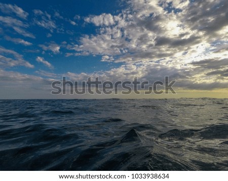 Beautiful view form the ocean and the sky seen from the ocean.