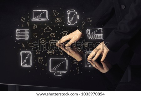 Man pressing table tablet hand touch interface with media icons and symbols