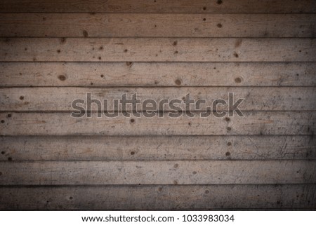 Vintage wooden boards background with vignetting frame. Grunge wood pattern. Rough panels backdrop. Dirty hardwood background. Natural material wall. Old weathered wood planks.  
