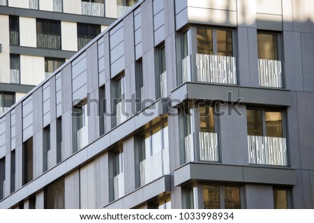 Modern office building, business center with miror glass windows Royalty-Free Stock Photo #1033998934