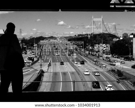 Man admiring a bridge