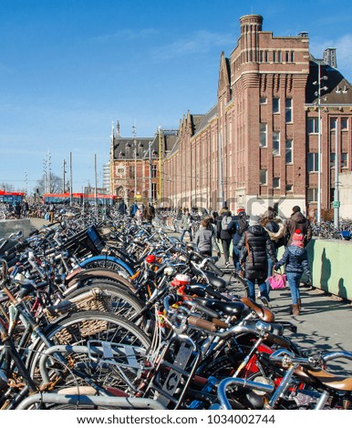 Many bicycles at the pedestrian street in Amsterdam.