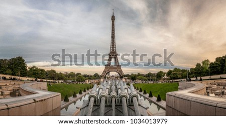 Classical Eiffel tower view with beautiful sunset on the background, Paris, France