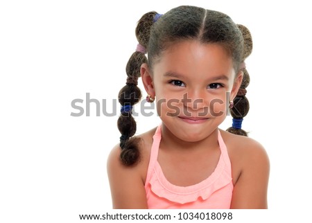 Portrait of a funny multiracial small girl smiling - Isolated on a white background